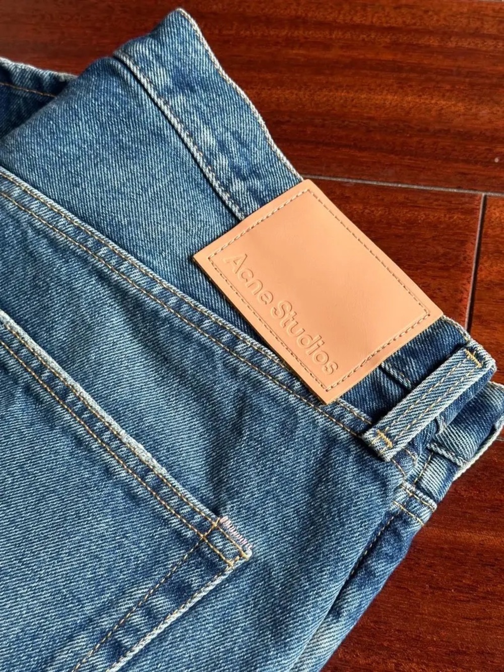 Acne Slim Men’s Light Blue Denim Jeans with Tan Leather Patch